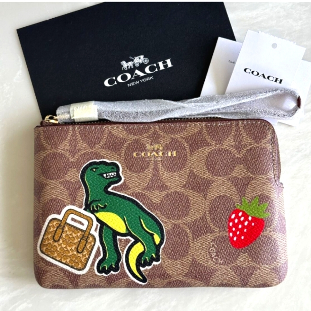 Coach signature leather dinosaur corner zip wristlet NEW WITH TAGS!